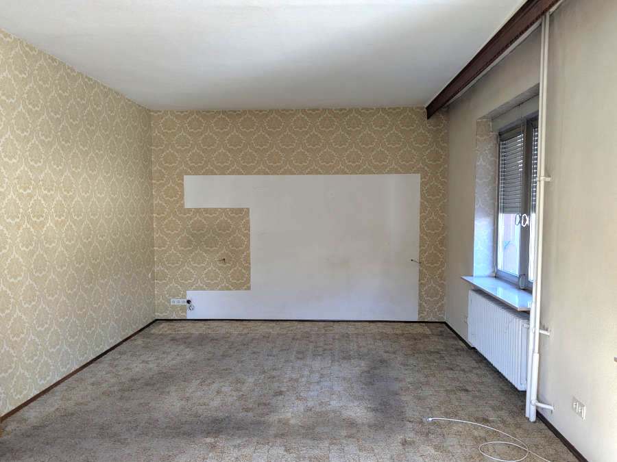 Entrümpelung in Darmstadt nachher: Ein leerer Raum, besenrein gesäubert, ist zu sehen.